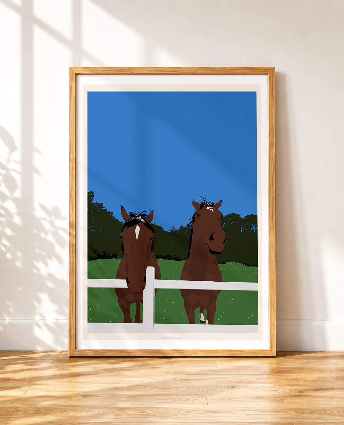 framed poster of Two horses behind a fence