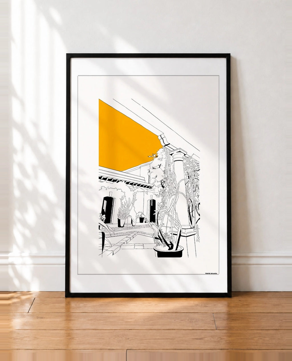 framed Black and white line drawing of a covered patio with a stone column, climbing vines, potted plants and a tiled roofline, with a bold orange triangle of sky in the upper corner