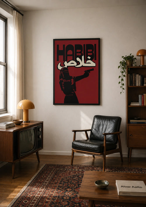 Habibi Khalas framed poster hanging in a mid-century style living room with a vintage TV and patterned rug
