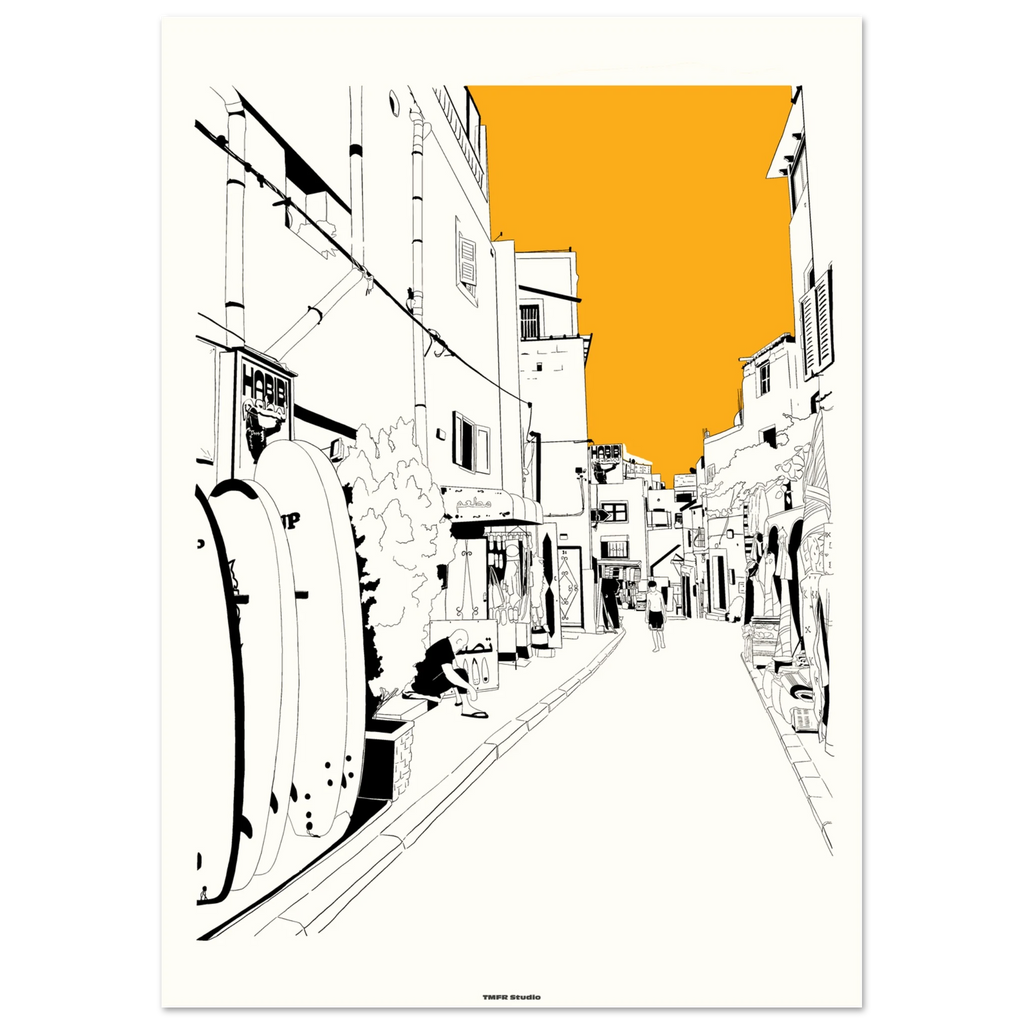 Black framed Taghazout street print with surfboards and an orange sky
