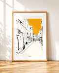 framed Taghazout street print with surfboards and an orange sky
