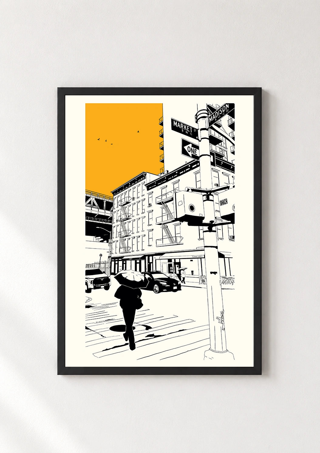 Black framed New York City street print with a person holding an umbrella at a Market Street crossing
