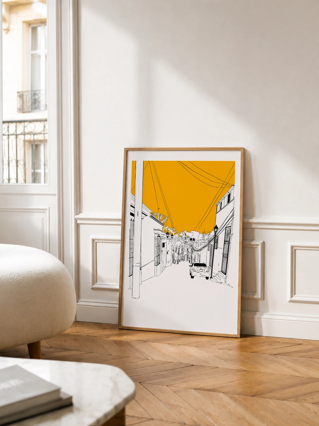 Oaxaca Street View framed poster in a Parisian living room with herringbone flooring and a balcony view
