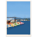 print of colorful pedal boats docked on a lake with sailboats and mountains